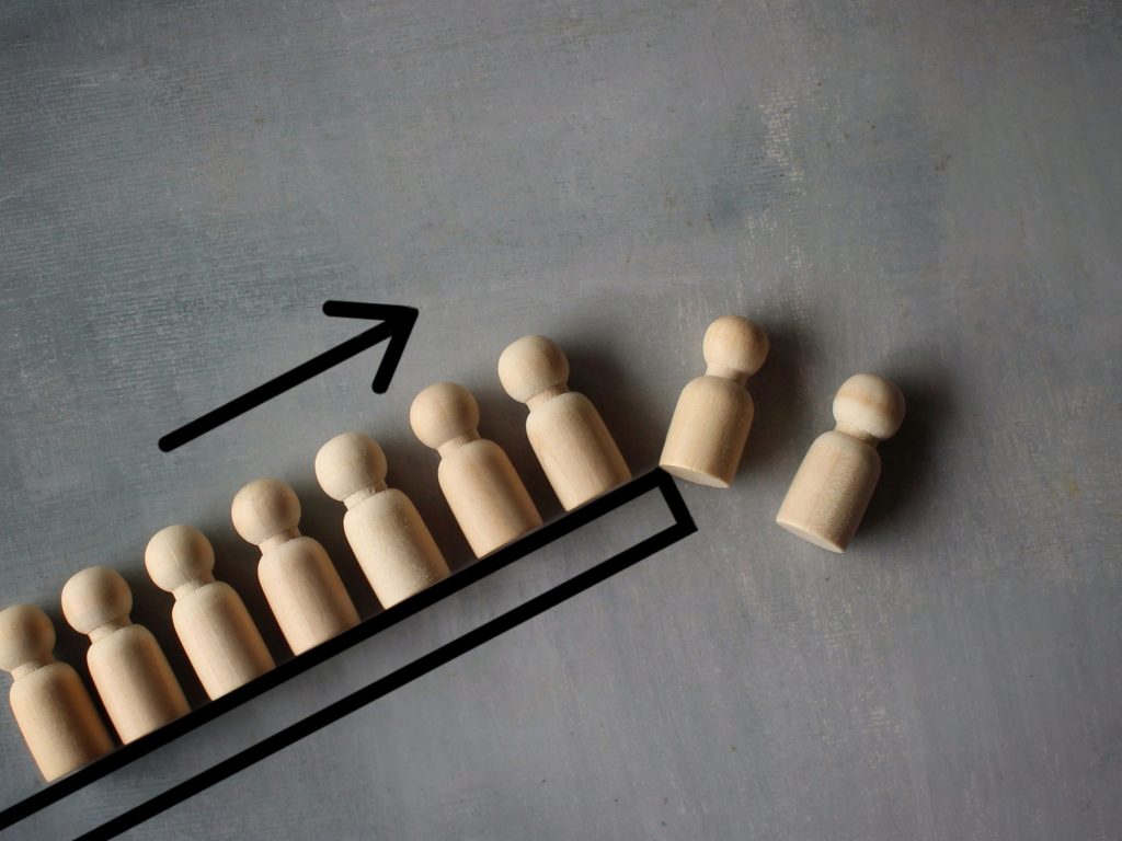 When AI Cuts Jobs But We Still Need to Build